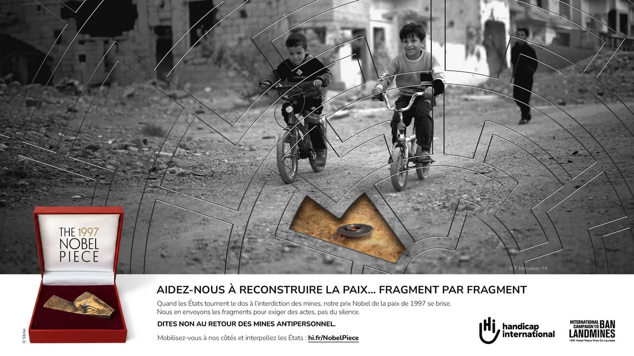 The 1997 Nobel Piece. Aidez-nous à reconstruire la paix... fragment par fragment.