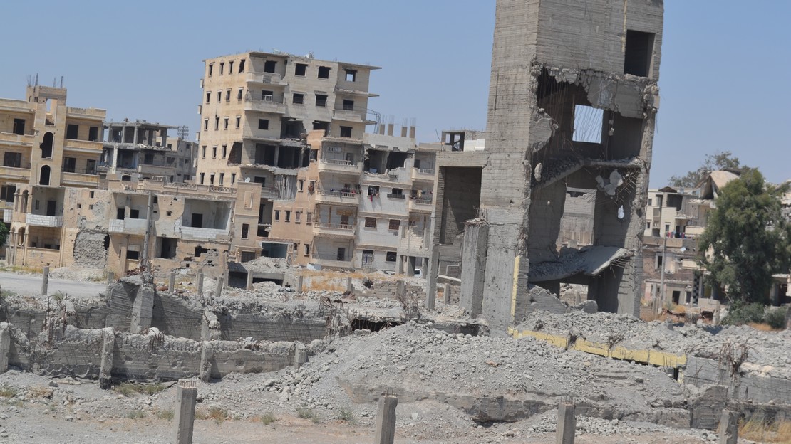 Immeubles détruits dans une zone d'habitation en Syrie